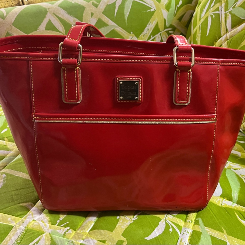 Dooney and Bourke Red Patent Leather Tote Bagwith gold stitching and embossing